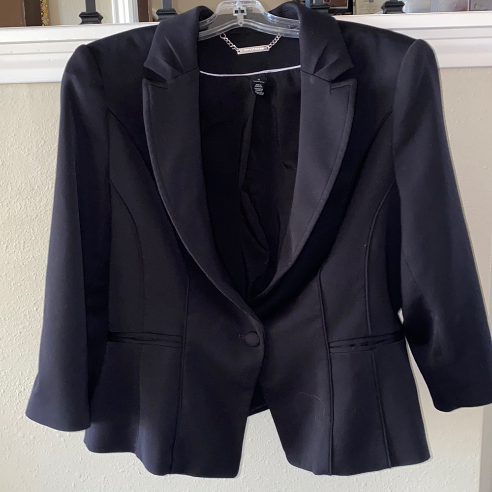 Simple feminine black suit jacket